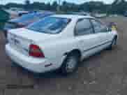 1994 Honda Accord with VIN 1HGCD564XRA014313, listed as a IAAI auction lot 42796801 with 76,616 mi miles and . Bid and sale history available at DreamBid. Image 4.