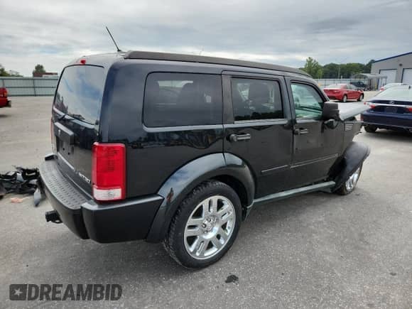 2011 Dodge Nitro Heat with VIN 1D4PT4GK0BW606180, listed as a Copart auction lot 71903985 with 135,991 mi miles and Salvage title. Bid and sale history available at DreamBid. Image 3.