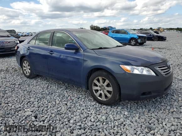 2007 Toyota Camry с VIN JTNBB46K273019852, выставлен на аукционе Copart как лот 82587175 с пробегом 146 905 миль миль и Списание • Salvage title. История ставок и продаж доступна на DreamBid. Изображение 4.