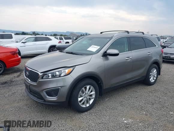 2016 Kia Sorento L with VIN 5XYPG4A30GG168509, listed as a IAAI auction lot 43076921 with 111,832 mi miles and . Bid and sale history available at DreamBid. Image 2.