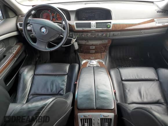 2004 BMW 7 Series 745i z VIN WBAGL63484DP69753, wystawiony jako Copart lot #49211195 z przebiegiem 203 767 mil mil oraz Czysty tytuł • Clean title. Historia ofert i sprzedaży dostępna na DreamBid. Obrazek 8.