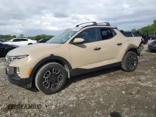 2023 Hyundai Santa Cruz SEL с VIN 5NTJCDAE1PH064057, выставлен на аукционе Copart как лот 55208965 с пробегом 22 988 миль миль и Списание • Salvage title. История ставок и продаж доступна на DreamBid. Изображение 1.