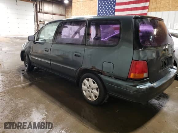 1997 Honda Odyssey LX z VIN JHMRA1868VC018947, wystawiony jako Copart lot #49537135 z przebiegiem 243 475 mil mil oraz Czysty tytuł • Clean title. Historia ofert i sprzedaży dostępna na DreamBid. Obrazek 2.