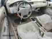 1993 Honda Civic z VIN 1HGEJ2149PL035582, wystawiony jako Copart lot #47945715 z przebiegiem 354 483 mil mil oraz Czysty tytuł • Clean title. Historia ofert i sprzedaży dostępna na DreamBid. Obrazek 8.