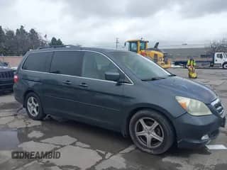 2005 Honda Odyssey Touring with VIN 5FNRL38895B061480, listed as a IAAI auction lot 41807150 with 190,261 mi miles and . Bid and sale history available at DreamBid. Image 1.