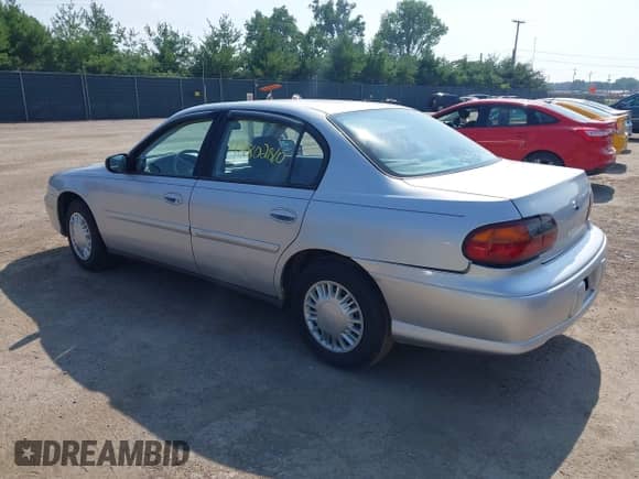 2005 Chevrolet Malibu Classic z VIN 1G1ND52F05M157948, wystawiony jako IAAI lot #42802810 z przebiegiem 61 473 mil mil oraz . Historia ofert i sprzedaży dostępna na DreamBid. Obrazek 3.