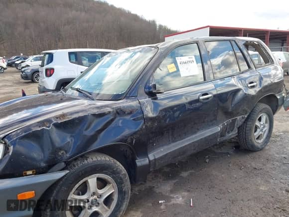 2004 Hyundai Santa Fe GLS z VIN KM8SC73E14U594107, wystawiony jako IAAI lot #41661919 z przebiegiem 138 946 mil mil oraz . Historia ofert i sprzedaży dostępna na DreamBid. Obrazek 6.