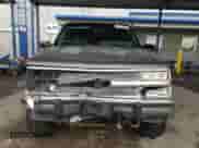 1993 Chevrolet Suburban z VIN 1GNFK16K7PJ392411, wystawiony jako Copart lot #43733375 z przebiegiem 245 702 mil mil oraz Szkoda całkowita • Salvage title. Historia ofert i sprzedaży dostępna na DreamBid. Obrazek 5.