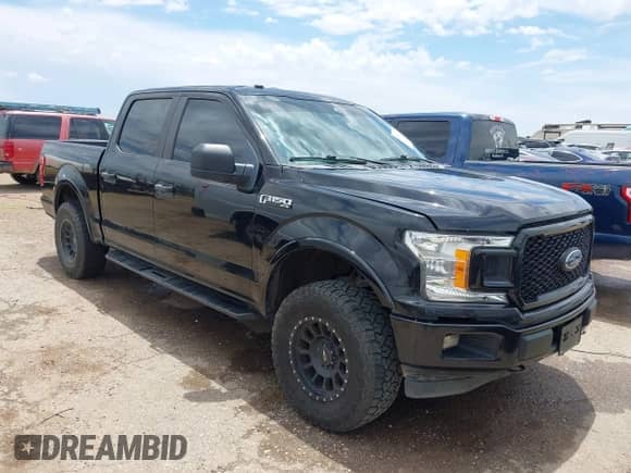 2019 Ford F-150 XLT with VIN 1FTEW1EP4KKD71122, listed as a IAAI auction lot 42580693 with 190,465 mi miles and . Bid and sale history available at DreamBid. Image 1.