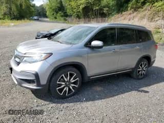 2021 Honda Pilot Touring 8-Passenger с VIN 5FNYF6H92MB003187, выставлен на аукционе Copart как лот 67054415 с пробегом 21 951 миль миль и Списание • Salvage title. История ставок и продаж доступна на DreamBid. Изображение 1.