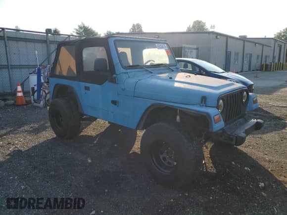 1998 Jeep Wrangler SE z VIN 1J4FY29P3WP794274, wystawiony jako Copart lot #69338475 z przebiegiem Nie podano mil oraz Czysty tytuł • Clean title. Historia ofert i sprzedaży dostępna na DreamBid. Obrazek 4.