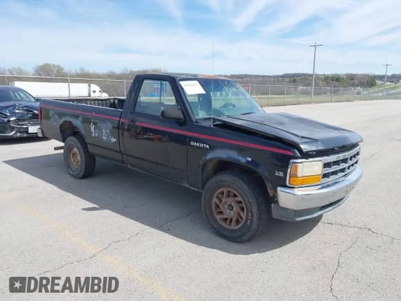 1992 Dodge Dakota z VIN 1B7GG26Y0NS500738, wystawiony jako IAAI lot #41864026 z przebiegiem 155 675 mil mil oraz . Historia ofert i sprzedaży dostępna na DreamBid. Obrazek 1.