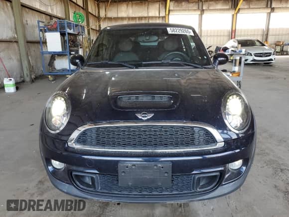2013 MINI Hardtop S с VIN WMWSV3C54DT393182, выставлен на аукционе Copart как лот 58229265 с пробегом 59 459 миль миль и Списание • Salvage title. История ставок и продаж доступна на DreamBid. Изображение 5.