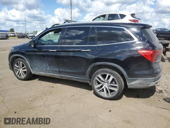 2018 Honda Pilot Touring with VIN 5FNYF5H91JB021704, listed as a Copart auction lot 70420785 with 127,929 mi miles and Clean title. Bid and sale history available at DreamBid. Image 2.