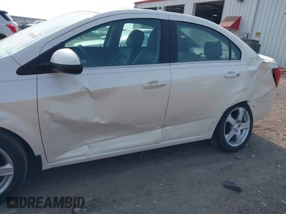 2013 Chevrolet Sonic LTZ with VIN 1G1JE5SB5D4195389, listed as a IAAI auction lot 42400418 with 27,607 mi miles and . Bid and sale history available at DreamBid. Image 6.