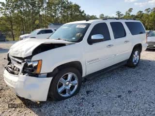 2014 Chevrolet Suburban LTZ с VIN 1GNSCKE0XER132827, выставлен на аукционе Copart как лот 50581815 с пробегом 71 480 миль миль и Списание • Salvage title. История ставок и продаж доступна на DreamBid. Изображение 1.