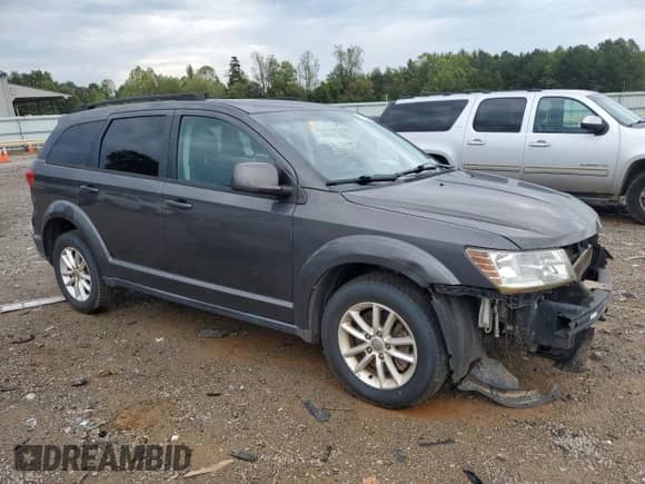 2015 Dodge Journey SXT with VIN 3C4PDDBG4FT526096, listed as a Copart auction lot 82119665 with 119,939 mi miles and Salvage title. Bid and sale history available at DreamBid. Image 4.