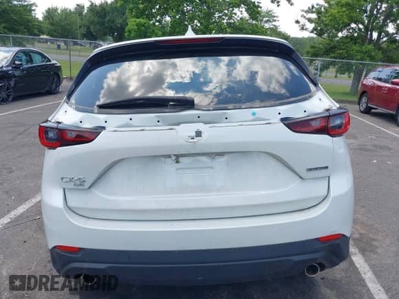 2023 Mazda CX-5 S Carbon Edition z VIN JM3KFBCMXP0211676, wystawiony jako IAAI lot #42642351 z przebiegiem 13 447 mil mil oraz . Historia ofert i sprzedaży dostępna na DreamBid. Obrazek 16.