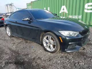 2015 BMW 4 Series 435i xDrive with VIN WBA3R5C58FK189577, listed as a IAAI auction lot 43152188 with 72,096 mi miles and . Bid and sale history available at DreamBid. Image 1.