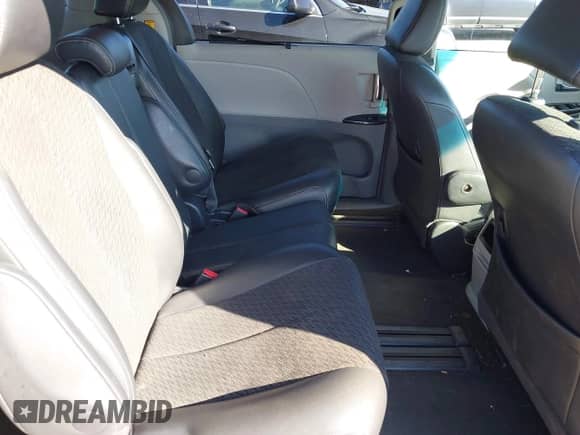 2013 Toyota Sienna SE z VIN 5TDXK3DC2DS302164, wystawiony jako IAAI lot #42792640 z przebiegiem 148 108 mil mil oraz . Historia ofert i sprzedaży dostępna na DreamBid. Obrazek 8.
