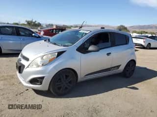 2014 Chevrolet Spark LS with VIN KL8CA6S96EC528021, listed as a Copart auction lot 65854595 with 84,272 mi miles and Clean title. Bid and sale history available at DreamBid. Image 1.