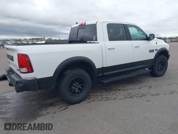 2018 Ram 1500 Rebel with VIN 1C6RR7YT8JS150942, listed as a IAAI auction lot 42168638 with 99,060 mi miles and . Bid and sale history available at DreamBid. Image 4.