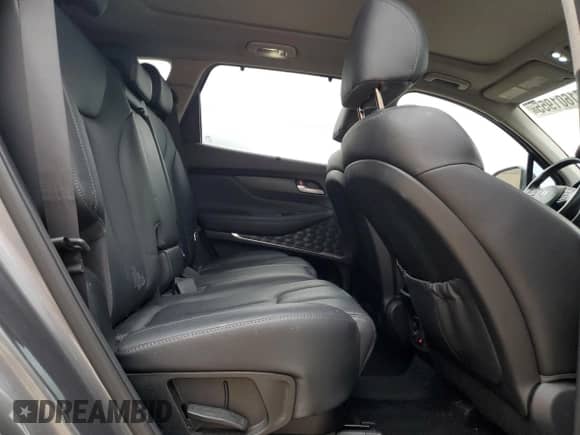 2019 Hyundai Santa Fe Ultimate с VIN 5NMS53AA4KH036246, выставлен на аукционе Copart как лот 71601955 с пробегом 112 998 миль миль и Списание • Salvage title. История ставок и продаж доступна на DreamBid. Изображение 11.