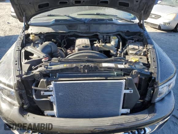 2005 Dodge 2500 SLT z VIN 3D7KS28C95G760756, wystawiony jako Copart lot #82155214 z przebiegiem 242 175 mil mil oraz Szkoda całkowita • Salvage title. Historia ofert i sprzedaży dostępna na DreamBid. Obrazek 11.