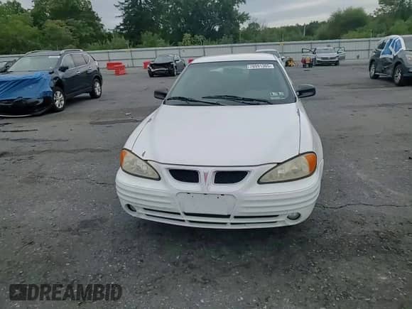 2001 Pontiac Grand Am SE1 с VIN 1G2NF52T41C177549, выставлен на аукционе Copart как лот 70991305 с пробегом 137 770 миль миль и Списание • Salvage title. История ставок и продаж доступна на DreamBid. Изображение 13.