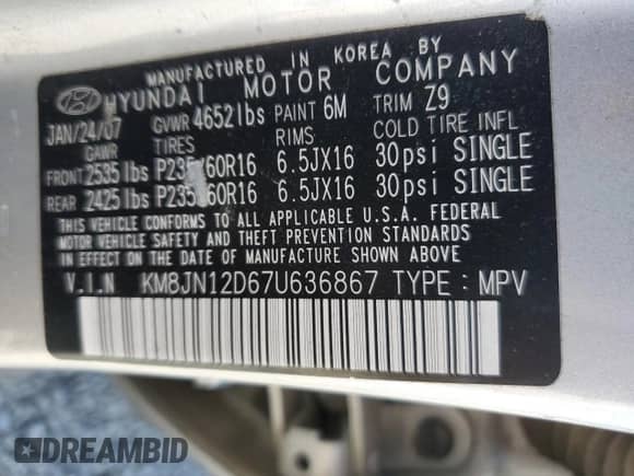 2007 Hyundai Tucson SE with VIN KM8JN12D67U636867, listed as a Copart auction lot 81274595 with 146,074 mi miles and Salvage title. Bid and sale history available at DreamBid. Image 13.