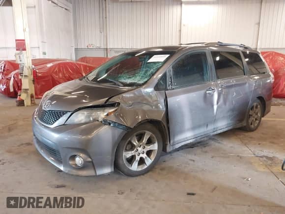 2011 Toyota Sienna SE with VIN 5TDXK3DC7BS034516, listed as a IAAI auction lot 41539955 with 209,309 mi miles and . Bid and sale history available at DreamBid. Image 22.