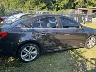 2014 Chevrolet Cruze LTZ z VIN 1G1PG5SB4E7332200, wystawiony jako IAAI lot #43201338 z przebiegiem 151 318 mil mil oraz . Historia ofert i sprzedaży dostępna na DreamBid. Obrazek 4.