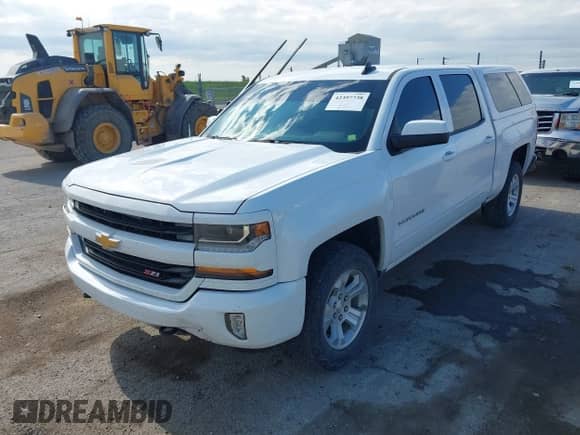 2016 Chevrolet Silverado 1500 LT with VIN 3GCUKRECXGG291194, listed as a IAAI auction lot 42397738 with 185,764 mi miles and . Bid and sale history available at DreamBid. Image 2.