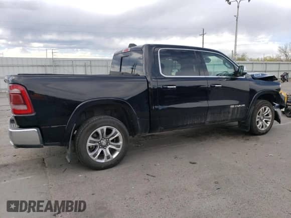 2020 Ram 1500 Longhorn with VIN 1C6SRFKT5LN220743, listed as a Copart auction lot 50660925 with 58,167 mi miles and Salvage title. Bid and sale history available at DreamBid. Image 3.