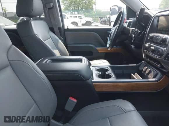 2014 Chevrolet Silverado 1500 LTZ z VIN 3GCUKSEJ0EG279669, wystawiony jako IAAI lot #42392561 z przebiegiem 77 128 mil mil oraz . Historia ofert i sprzedaży dostępna na DreamBid. Obrazek 5.