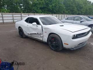 2012 Dodge Challenger R/T with VIN 2C3CDYBT2CH155385, listed as a IAAI auction lot 42210312 with 111,892 mi miles and . Bid and sale history available at DreamBid. Image 1.