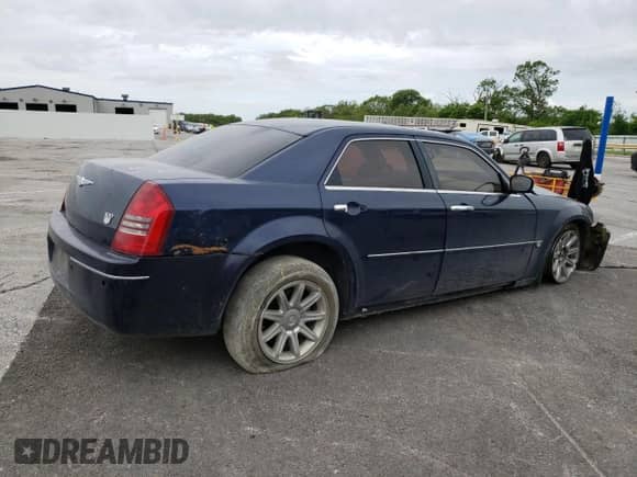 2006 Chrysler 300 C with VIN 2C3KA63H66H240561, listed as a Copart auction lot 71257935 with 188,941 mi miles and Salvage title. Bid and sale history available at DreamBid. Image 3.