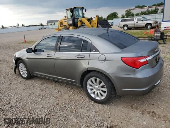 2013 Chrysler 200 Touring with VIN 1C3CCBBB8DN762620, listed as a Copart auction lot 68827495 with 130,834 mi miles and Salvage title. Bid and sale history available at DreamBid. Image 2.
