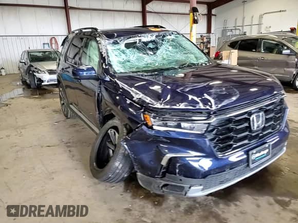 2024 Honda Pilot Touring with VIN 5FNYG1H78RB043666, listed as a Copart auction lot 64004205 with 18,734 mi miles and Salvage title. Bid and sale history available at DreamBid. Image 13.