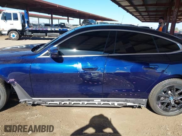 2023 BMW i4 eDrive35 with VIN WBY43AW09PFP53618, listed as a IAAI auction lot 43119545 with 20,281 mi miles and . Bid and sale history available at DreamBid. Image 15.