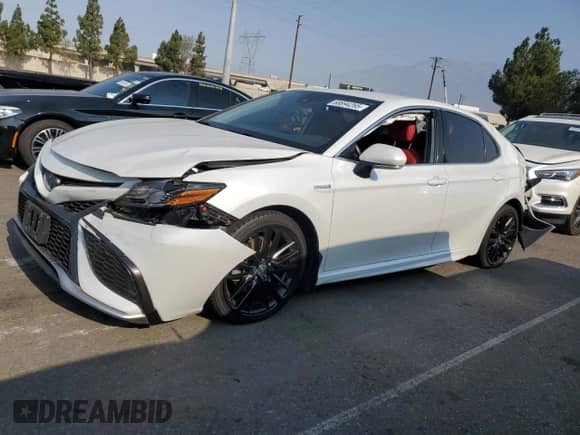 2021 Toyota Camry Hybrid XSE with VIN 4T1K31AKXMU548944, listed as a Copart auction lot 68894265 with 81,648 mi miles and Salvage title. Bid and sale history available at DreamBid. Image 1.