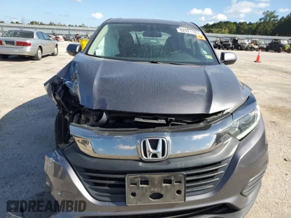 2020 Honda HR-V LX z VIN 3CZRU6H34LM725965, wystawiony jako Copart lot #82021185 z przebiegiem 67 721 mil mil oraz Szkoda całkowita • Salvage title. Historia ofert i sprzedaży dostępna na DreamBid. Obrazek 5.