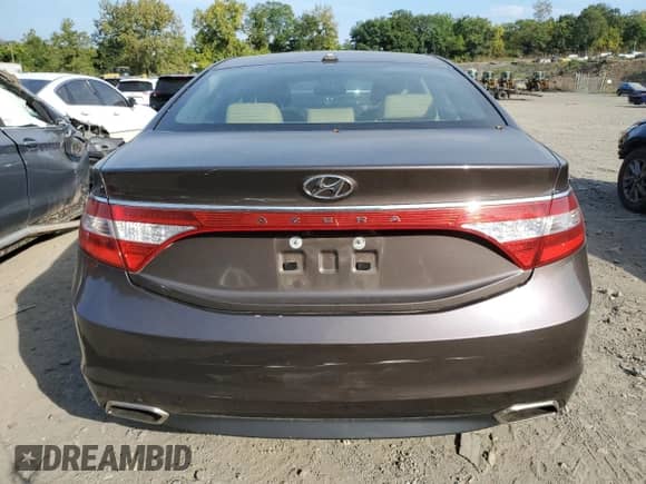 2015 Hyundai Azera с VIN KMHFG4JG5FA476297, выставлен на аукционе Copart как лот 72401584 с пробегом 61 484 миль миль и Списание • Salvage title. История ставок и продаж доступна на DreamBid. Изображение 6.