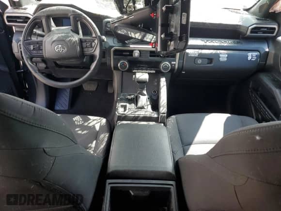 2024 Toyota Tacoma SR with VIN 3TYKD5HN0RT013601, listed as a Copart auction lot 69126575 with 4,033 mi miles and Salvage title. Bid and sale history available at DreamBid. Image 8.