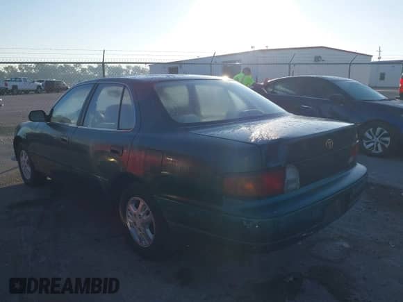 1996 Toyota Camry DX with VIN JT2BG12K8T0363541, listed as a IAAI auction lot 37847965 with 182,241 mi miles and . Bid and sale history available at DreamBid. Image 3.