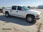2001 Dodge Dakota Sport с VIN 1B7HL2AX81S343985, выставлен на аукционе Copart как лот 82498565 с пробегом 247 286 миль миль и Списание • Salvage title. История ставок и продаж доступна на DreamBid. Изображение 4.