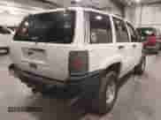 1998 Jeep Grand Cherokee Laredo z VIN 1J4GZ48Y3WC230722, wystawiony jako IAAI lot #43373852 z przebiegiem Nie podano mil oraz . Historia ofert i sprzedaży dostępna na DreamBid. Obrazek 4.