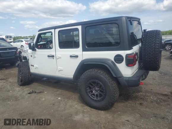 2022 Jeep Wrangler Unlimited Rubicon with VIN 1C4JJXFG6NW124065, listed as a Copart auction lot 67817425 with 60,324 mi miles and Salvage title. Bid and sale history available at DreamBid. Image 2.