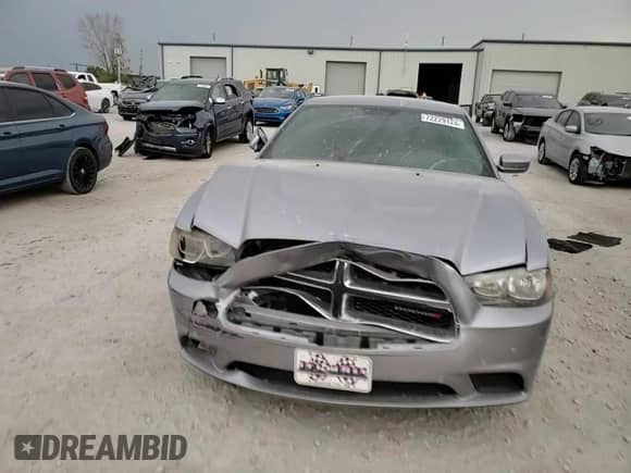 2013 Dodge Charger SE z VIN 2C3CDXBG3DH678557, wystawiony jako Copart lot #72229124 z przebiegiem 150 690 mil mil oraz Szkoda całkowita • Salvage title. Historia ofert i sprzedaży dostępna na DreamBid. Obrazek 10.