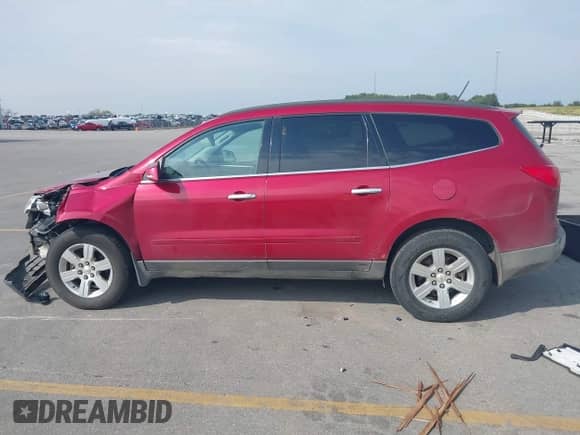 2012 Chevrolet Traverse 2LT with VIN 1GNKVJED7CJ138426, listed as a IAAI auction lot 43244176 with 243,793 mi miles and . Bid and sale history available at DreamBid. Image 14.